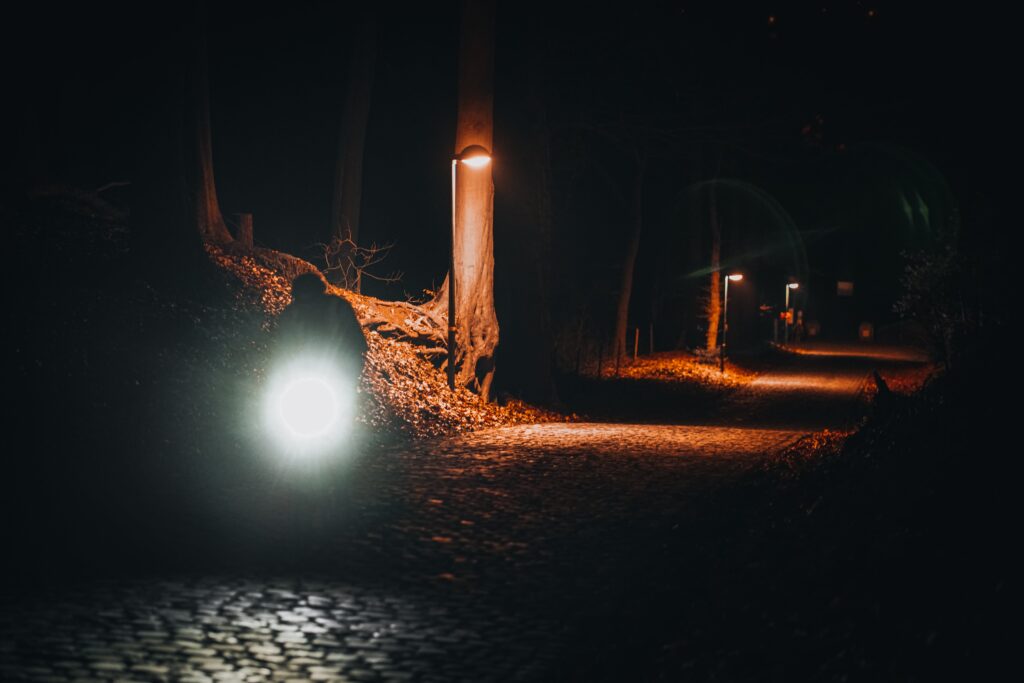 Cyclism. Nol van Loon rides over Flanders cobbles trough the night.